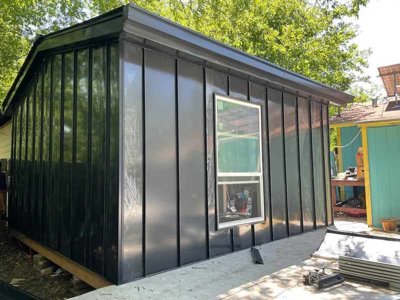 Black standing seam metal wall panels for Roof Inspection in Ross