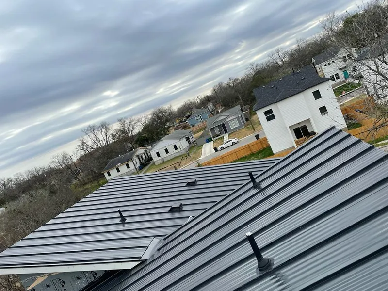 Standing seam metal roof panels with vents for Skylight Repair in Ross